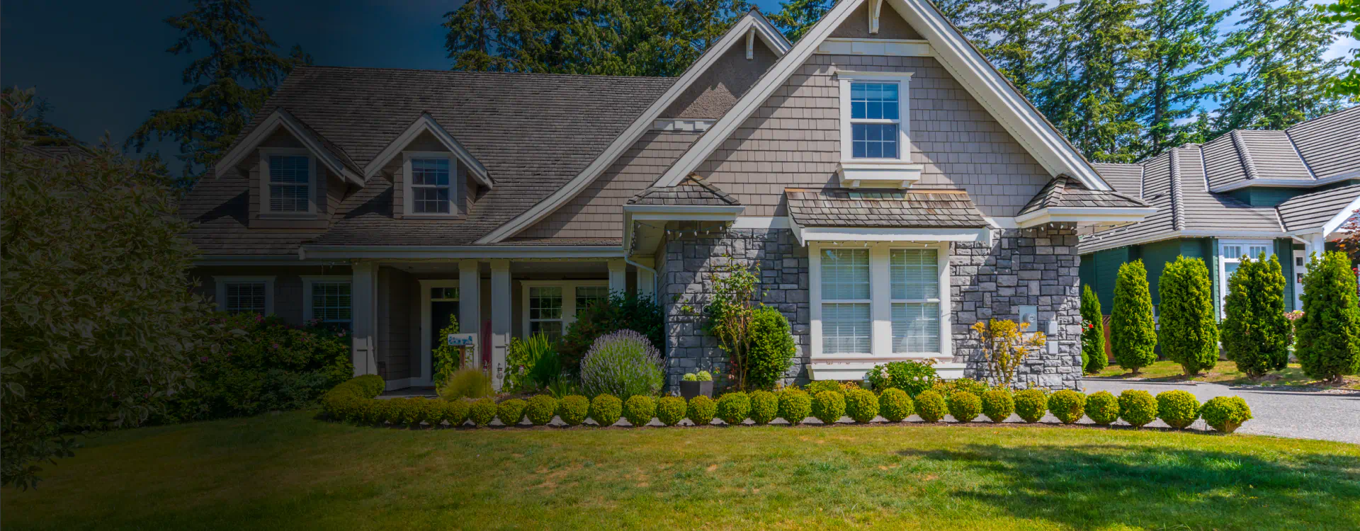 big house with wide lawn area